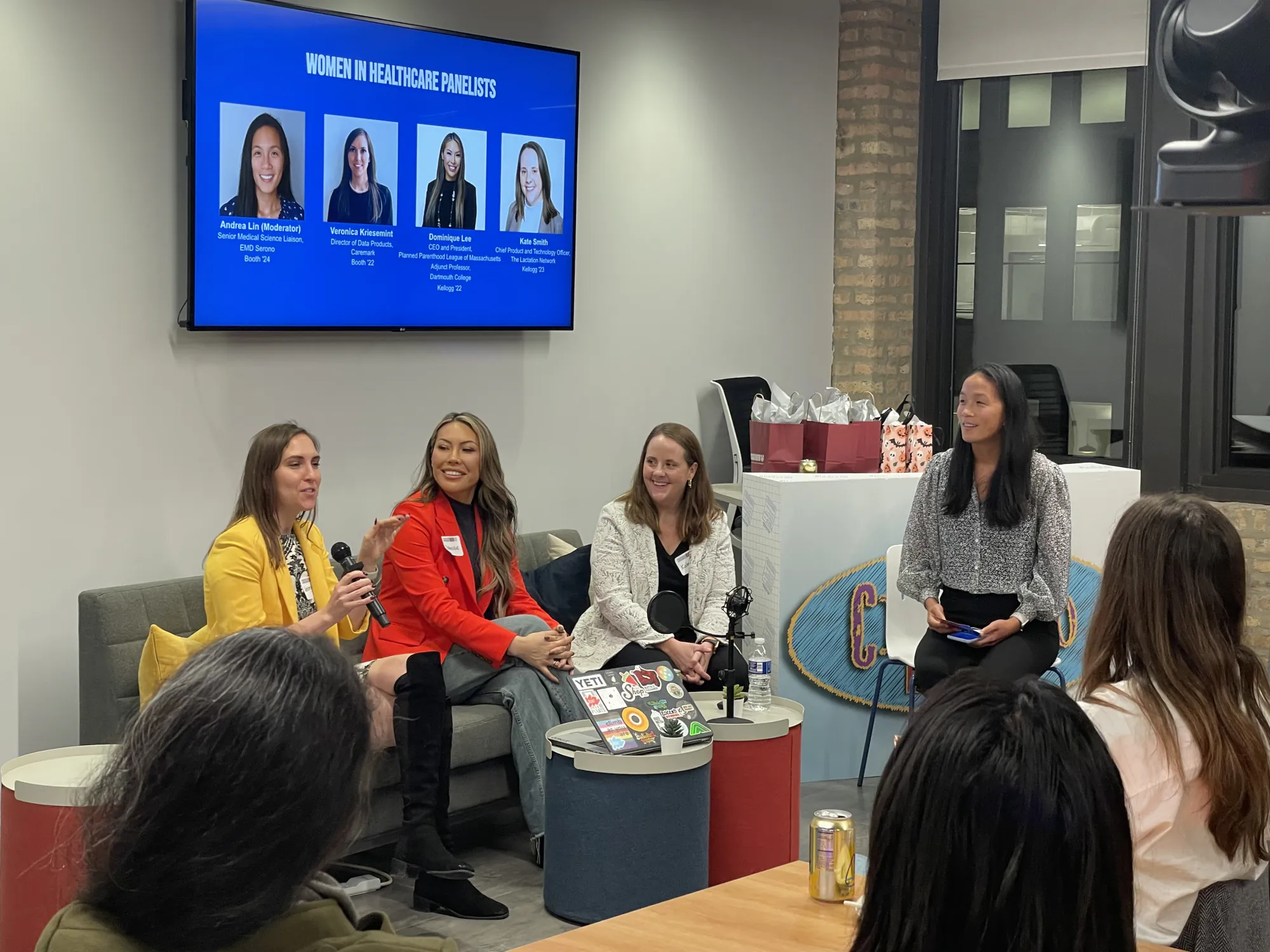 Women in Healthcare panel discussion with panelists seated in front of the audience